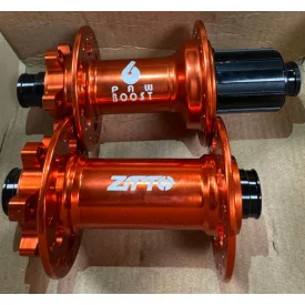   15x110/12x148mm 32LY ZTTO Ipari csapágyas HG kazettás agy pár Narancs színben